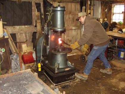 Forging a hand hammer during a cold winter day.