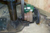 Motor mount plate curves around center frame