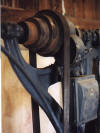 Step pulley mounted on upper drive shaft