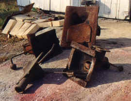 Cast iron firepots for use in blacksmith's coal forges.