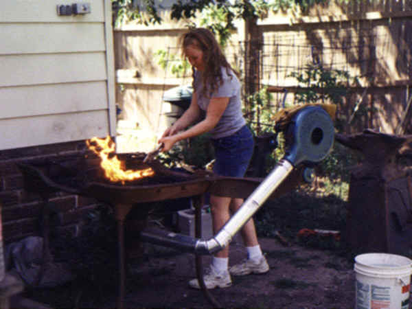 Canedy-Otto cast iron blacksmith's forge and Western Royal Chief blower.
