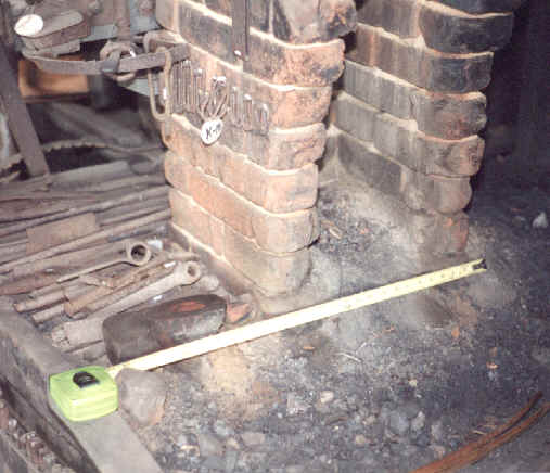 Chimney opening is roughly 9 inches wide.