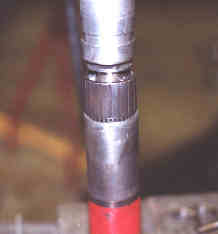 Pressing sleeve off.