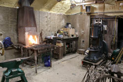 First forge fire lit since renovation began in 2018