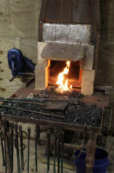 First forge fire lit since renovation began in 2018