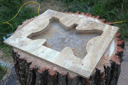 Anvil depression routered into top of log stand