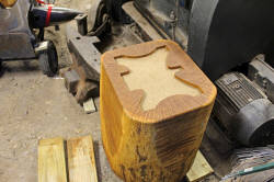 1/2-inch of sand in bottom of depression under anvil