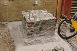 Lower forge chimney base partially finished