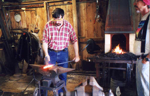Tongs making demo 2001. Every step demonstrated at the anvil.