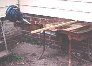 Long bars placed only as deep as sides of the hearth allow.