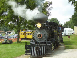  Steam approaching North Village -Passing front of blacksmith shop. 2007